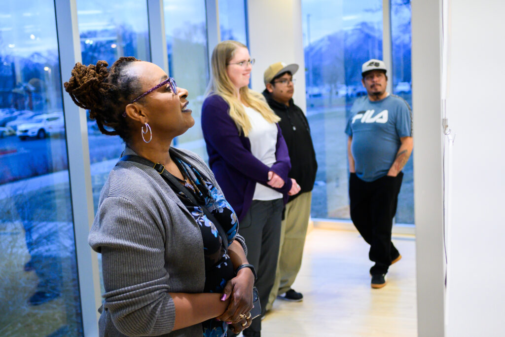 Women looks at photo.